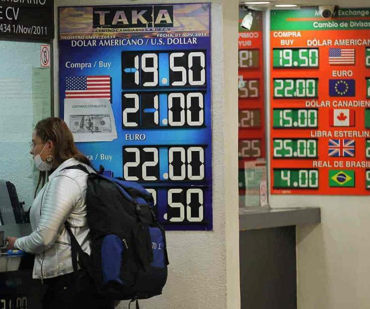 Peso pierde por toma de utilidades y cierra en 21.88