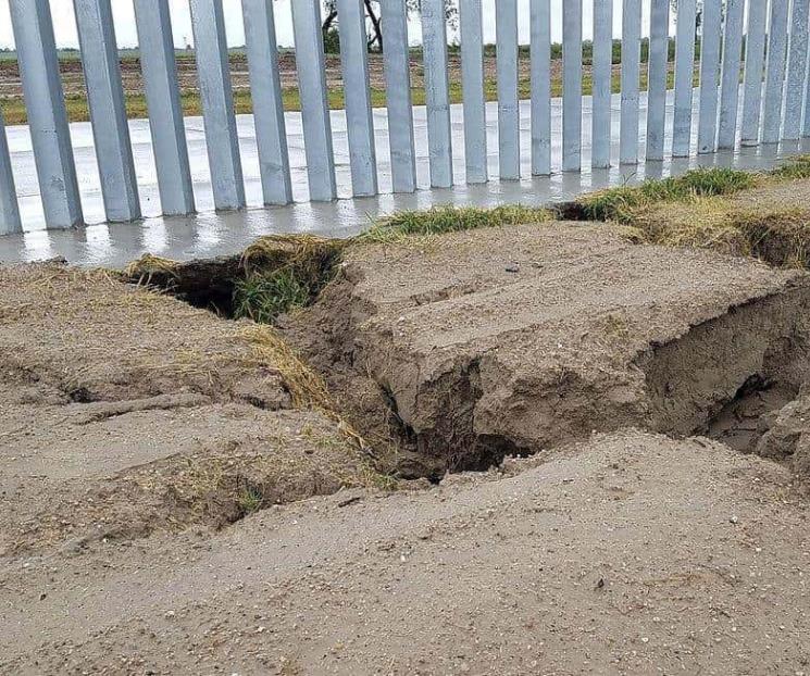 Erosiona Hanna suelo de muro fronterizo