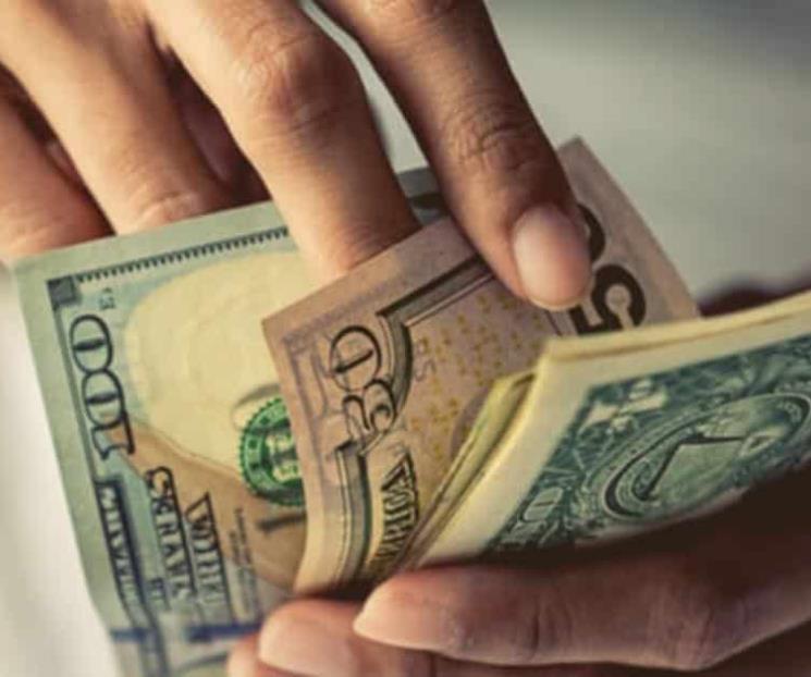 Dólar baja a 20.93 pesos en ventanillas Dólar baja a 20.93 pesos en ventanillas