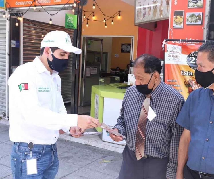 Reparte material informativo la FEDE Reparte material informativo la FEDE