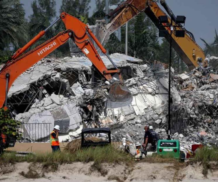 Sube a 86 muertos por derrumbe Sube a 86 muertos por derrumbe