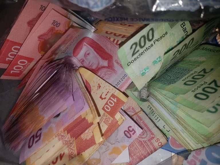 Reportan menor uso de efectivo en AL