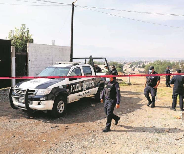 Asesinan a familia en Tultepec; aún estaban en cama