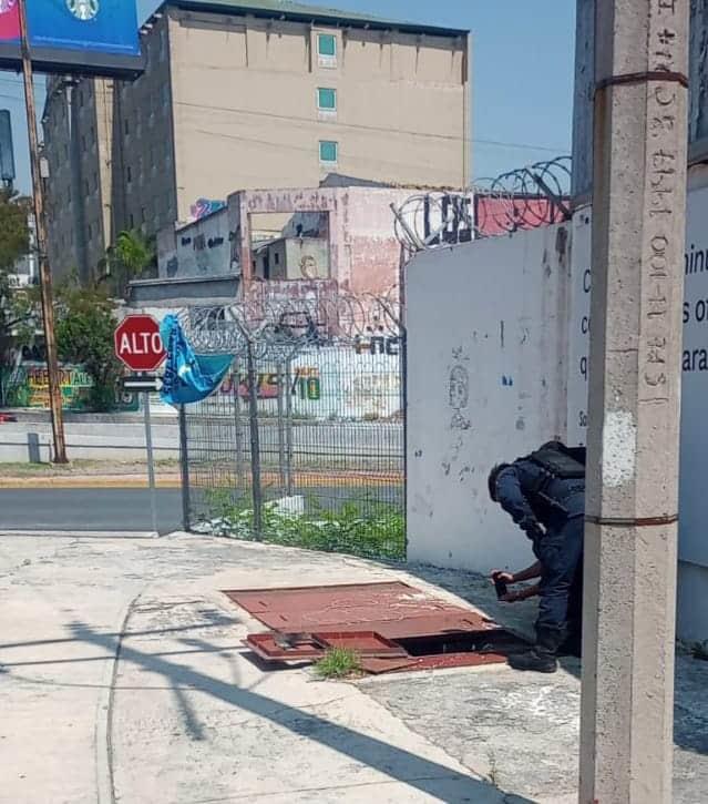 Hallan cadáver en alcantarilla