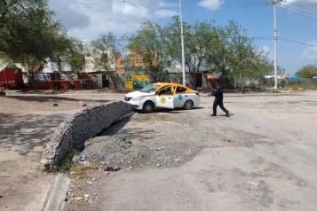Ejecutan a dos en taxi en Cadereyta