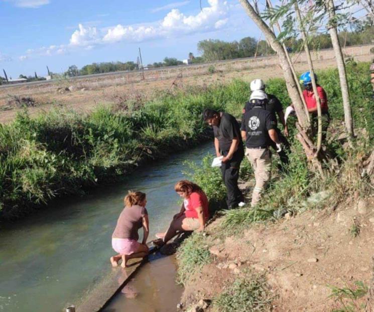 Mujer y menores se meten a arroyo, casi se ahogan