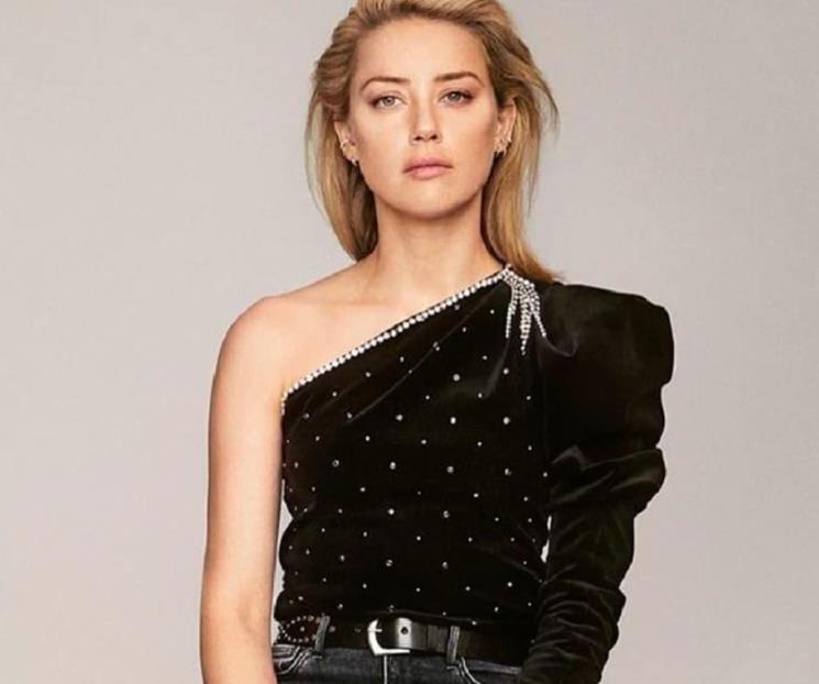 Amber Heard habría pedido dinero para pagarle a Depp Amber Heard habría pedido dinero para pagarle a Depp