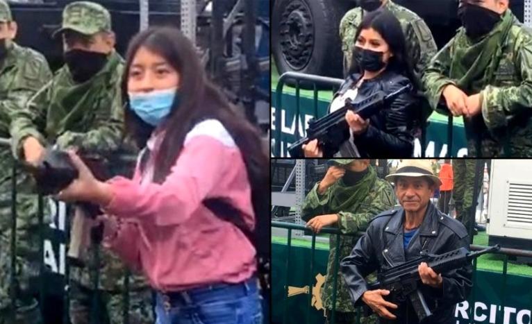 Militares prestan fusil a asistentes para tomarse fotos