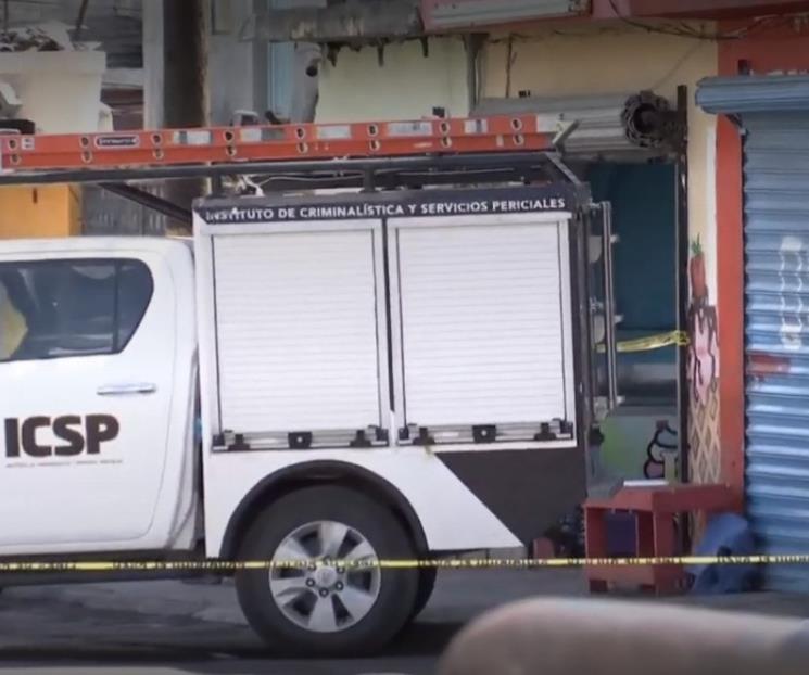 Ejecutan a comerciante en puesto de tacos