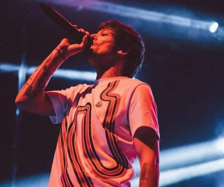 Louis Tomlinson se rompe el brazo y pospone firmas