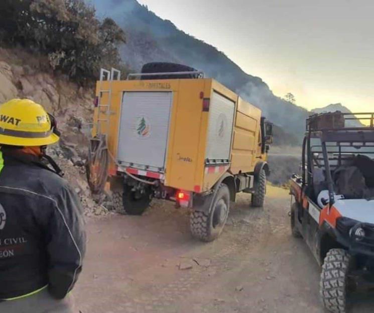 Logran controlar incendio en Sierra de Santiago Logran controlar incendio en Sierra de Santiago