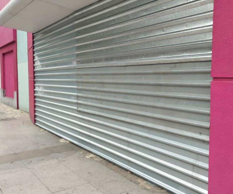 Se blindan comercios ante marcha feminista Se blindan comercios ante marcha feminista