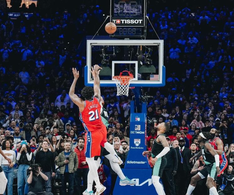 Sixers vencen con lo justo a Portland
