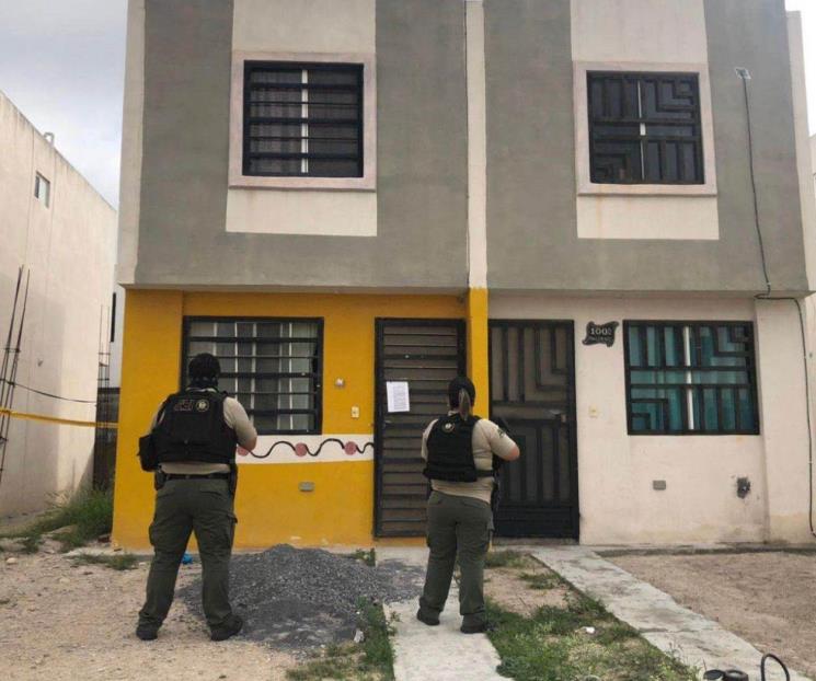 Hallan restos humanos enterrados en patio