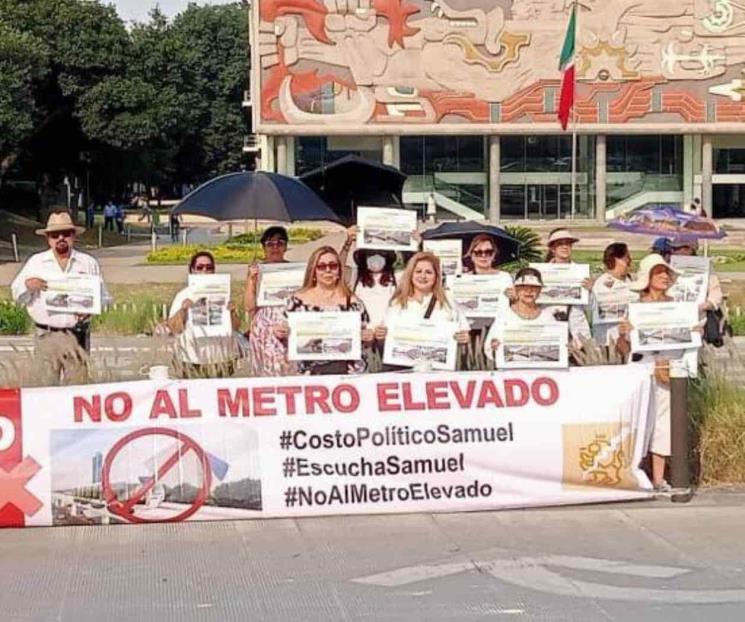 Protestan vecinos contra proyecto de Línea 5