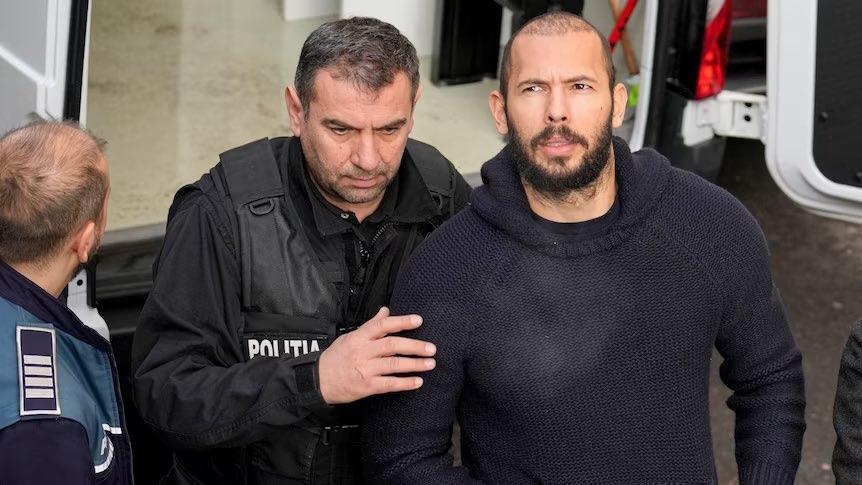 Tate, acusado de violación y trata de personas