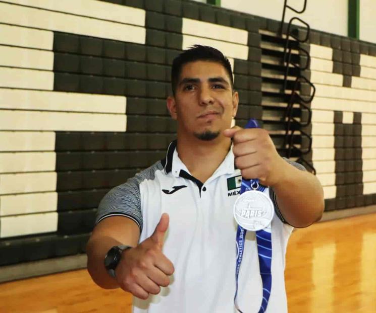 Román Ruiz rompe marca y obtiene plaza olímpica para México