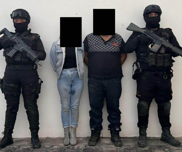 Cae pareja con arma larga y droga