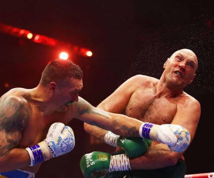 Vence Usyk a Fury en posible pelea del año