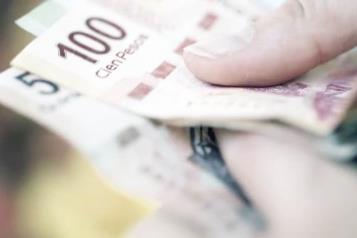 Cierra peso en sexenio con 19.70 por d&oacute;lar