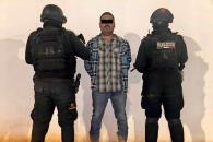 Detienen a conductor empistolado