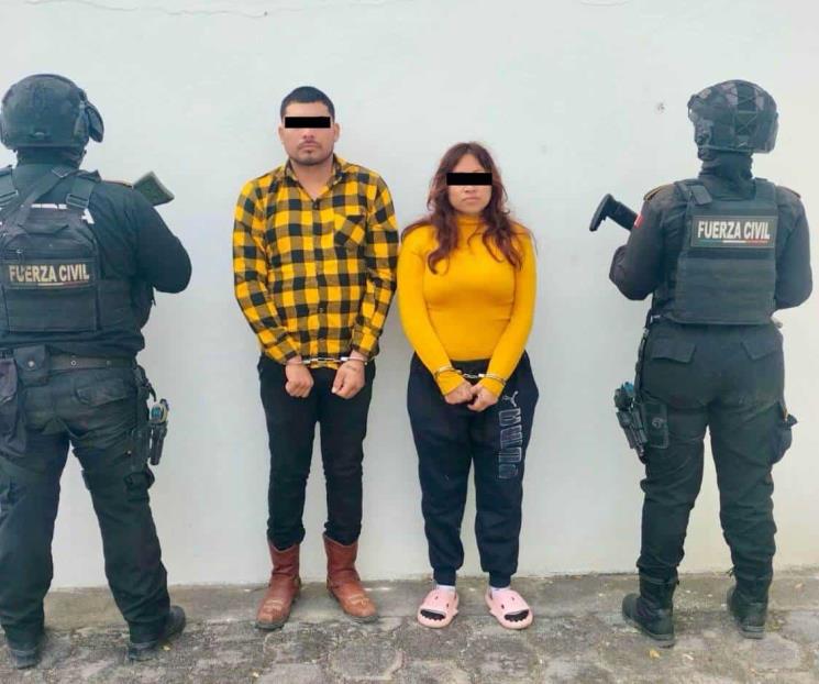 Cae pareja con arma de fuego