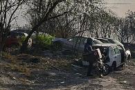 Descubren un ejecutado tras sofocar llamas