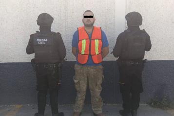 Detienen a hombre con arma de fuego