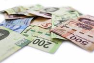 Peso mexicano se debilita frente al dólar y cierra en 19.50 Peso mexicano se debilita frente al dólar y cierra en 19.50