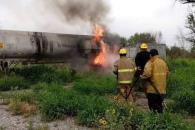 Arde pipa cargada con asfalto Arde pipa cargada con asfalto