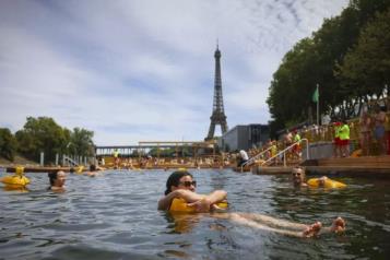 Reabre Par&iacute;s el r&iacute;o Sena para los ba&ntilde;istas m&aacute;s de un siglo despu&eacute;s