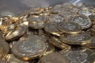 Peso retrocede antes el dólar tras anuncio de aranceles de EU