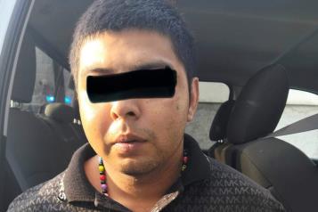 Amenaza a taxista con arma de fuego