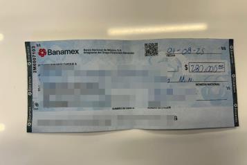 Intenta cobrar cheque robado