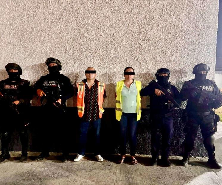 Cae pareja con arma y droga