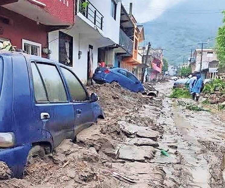 Asciende a 64 fallecidos por lluvias en 5 estados de México Asciende a 64 fallecidos por lluvias en 5 estados de México
