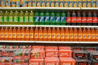 Industria refresquera reducirá contenido de azúcar en sus productos