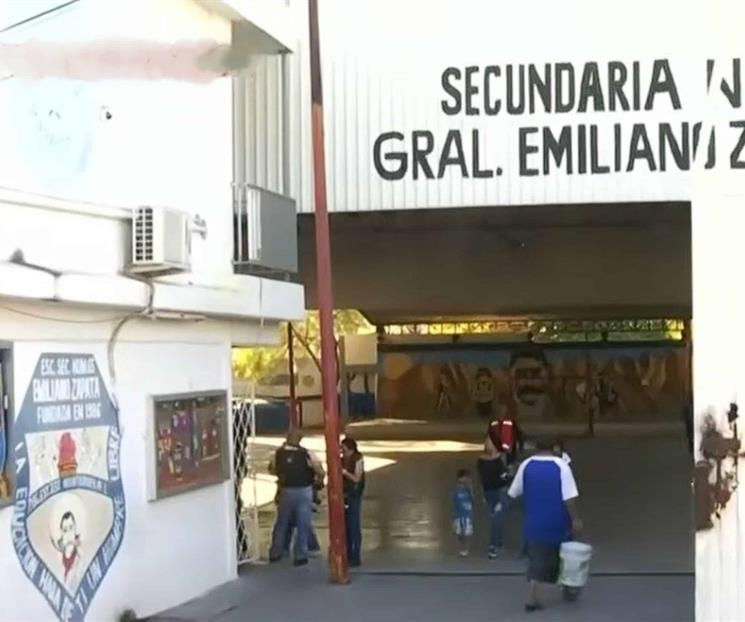 Amenaza con fusil a su maestra y compañeros Amenaza con fusil a su maestra y compañeros