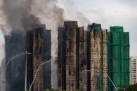 Suben a 94 los muertos por incendio en Hong Kong