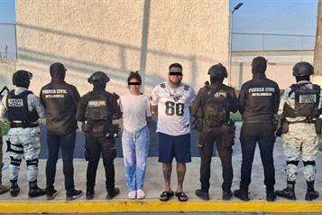 Detienen a pareja con armas y droga