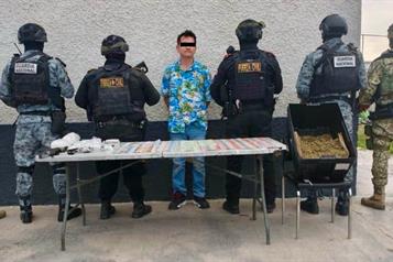 Cae con arma de fuego, droga y dinero