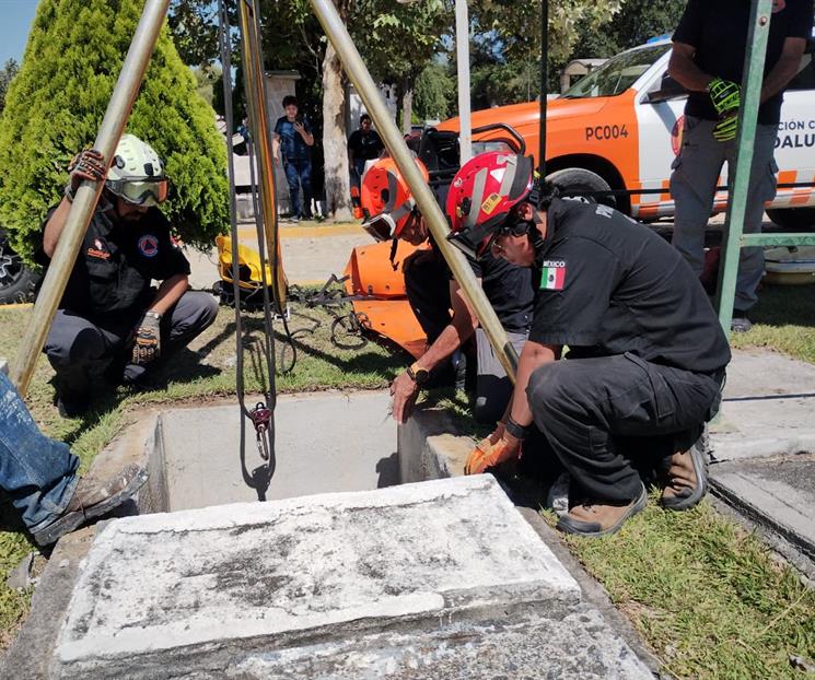 Cae mujer a tumba Cae mujer a tumba