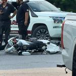 Balean a dos a bordo de moto