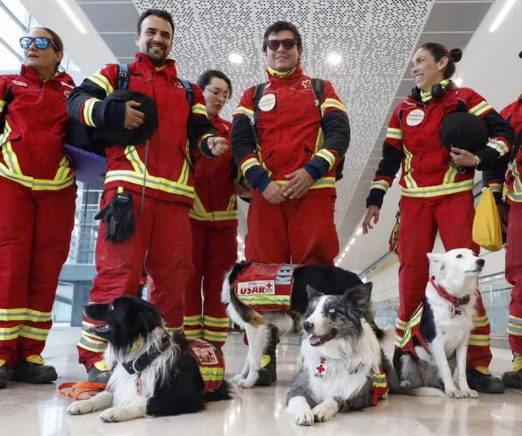 Regresan rescatistas tras misi&oacute;n en Venezuela
